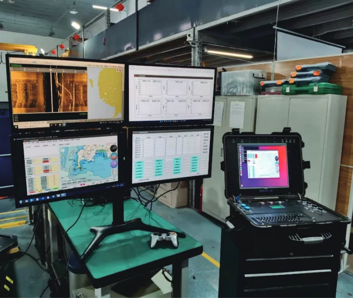 Multi-screen monitoring workstation in the Pengpai Ocean manufacturer brochure, shown as a control-equipment reference.