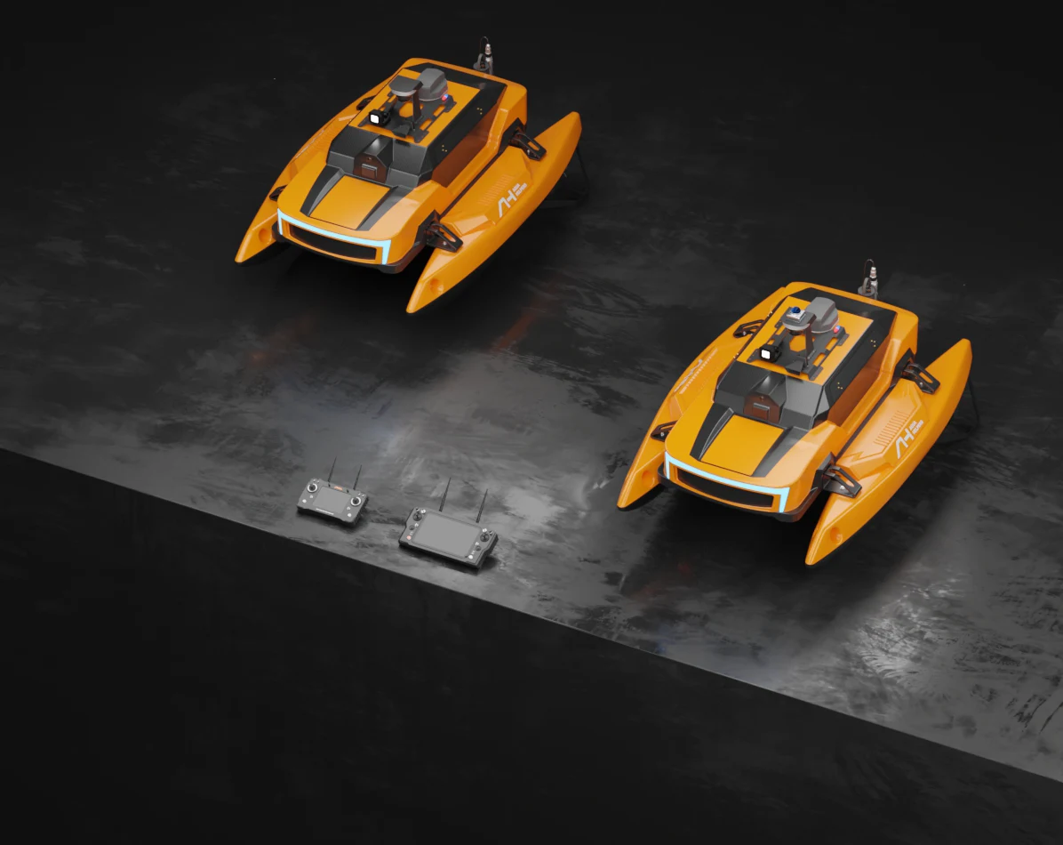 Two orange Aqua Helpers HUNTER unmanned surface vessels with handheld controllers on a dark ground, shown in a manufacturer render.