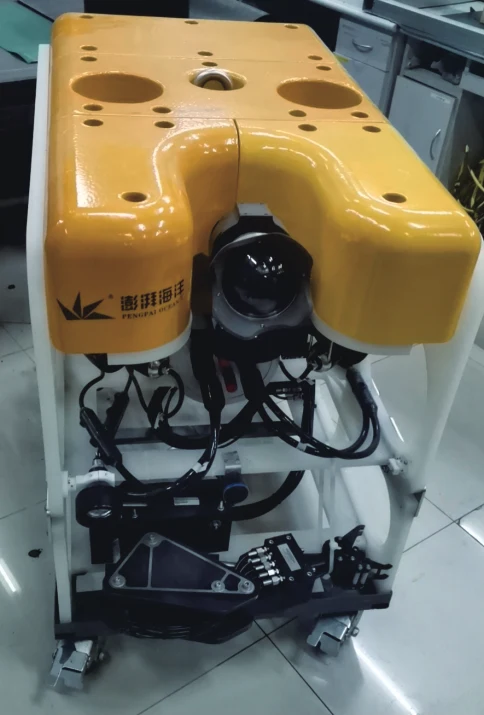 Yellow Pengpai Ocean ROV in a workshop, shown in a manufacturer catalogue photograph; exact model unconfirmed.
